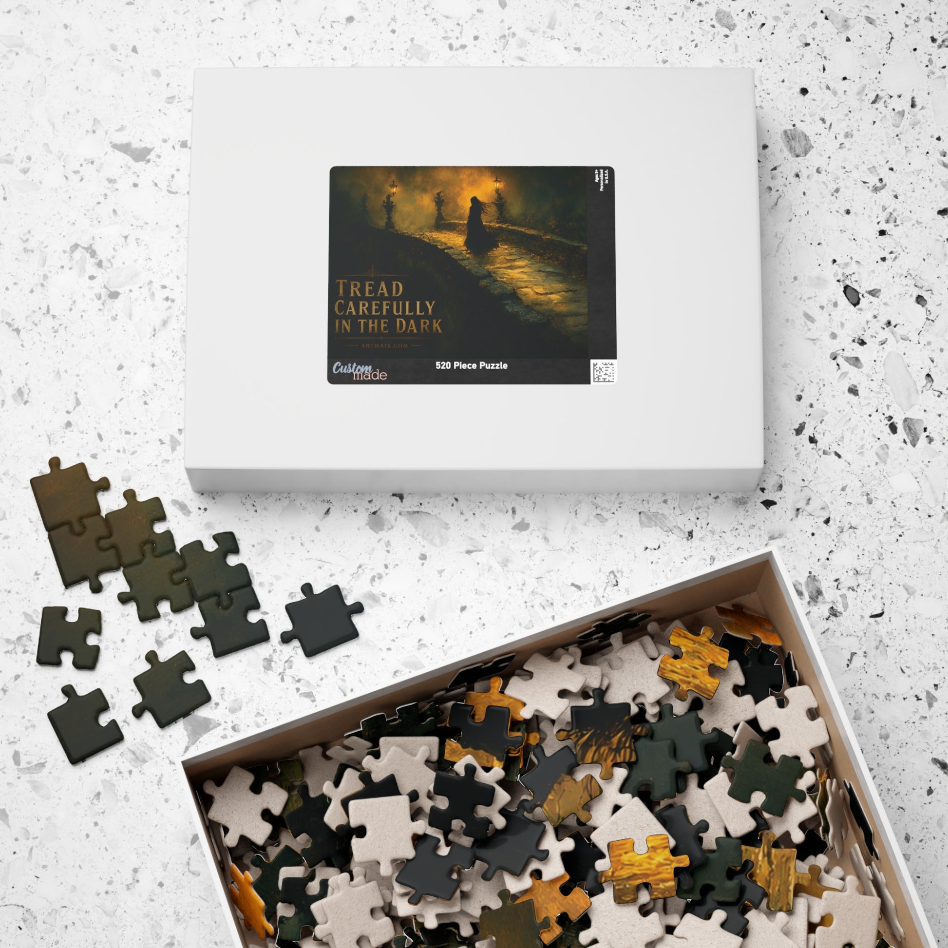 ARCHAIX Tread Carefully 520-piece puzzle shown with loose puzzle pieces