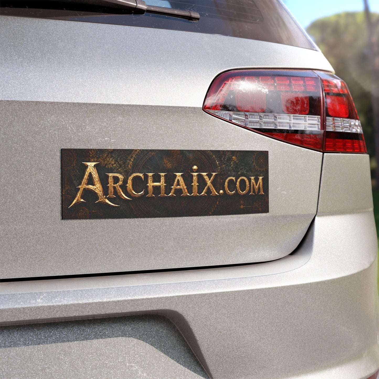 ARCHAIX curved gold wordmark 10 × 3 car magnet on dark background